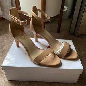 Nude ankle strap heel, new never worn in box.